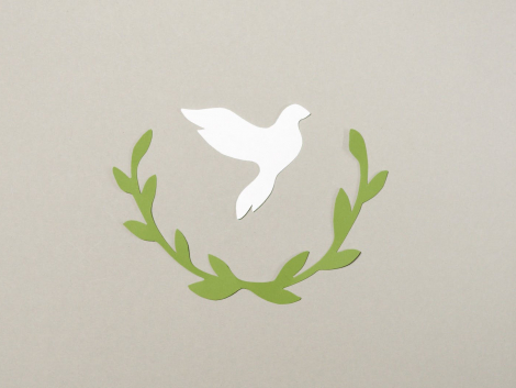 paper cutouts on a gray surface